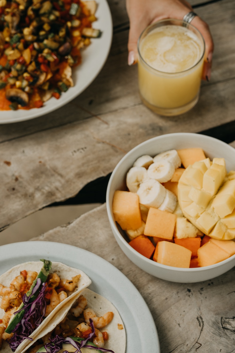 juice and a plate of fruit
