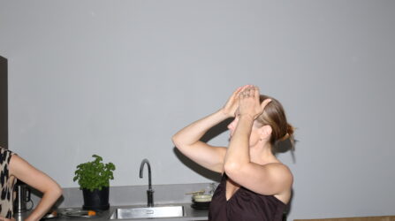 women putting her hands on the head