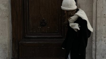 women in coat grey weather